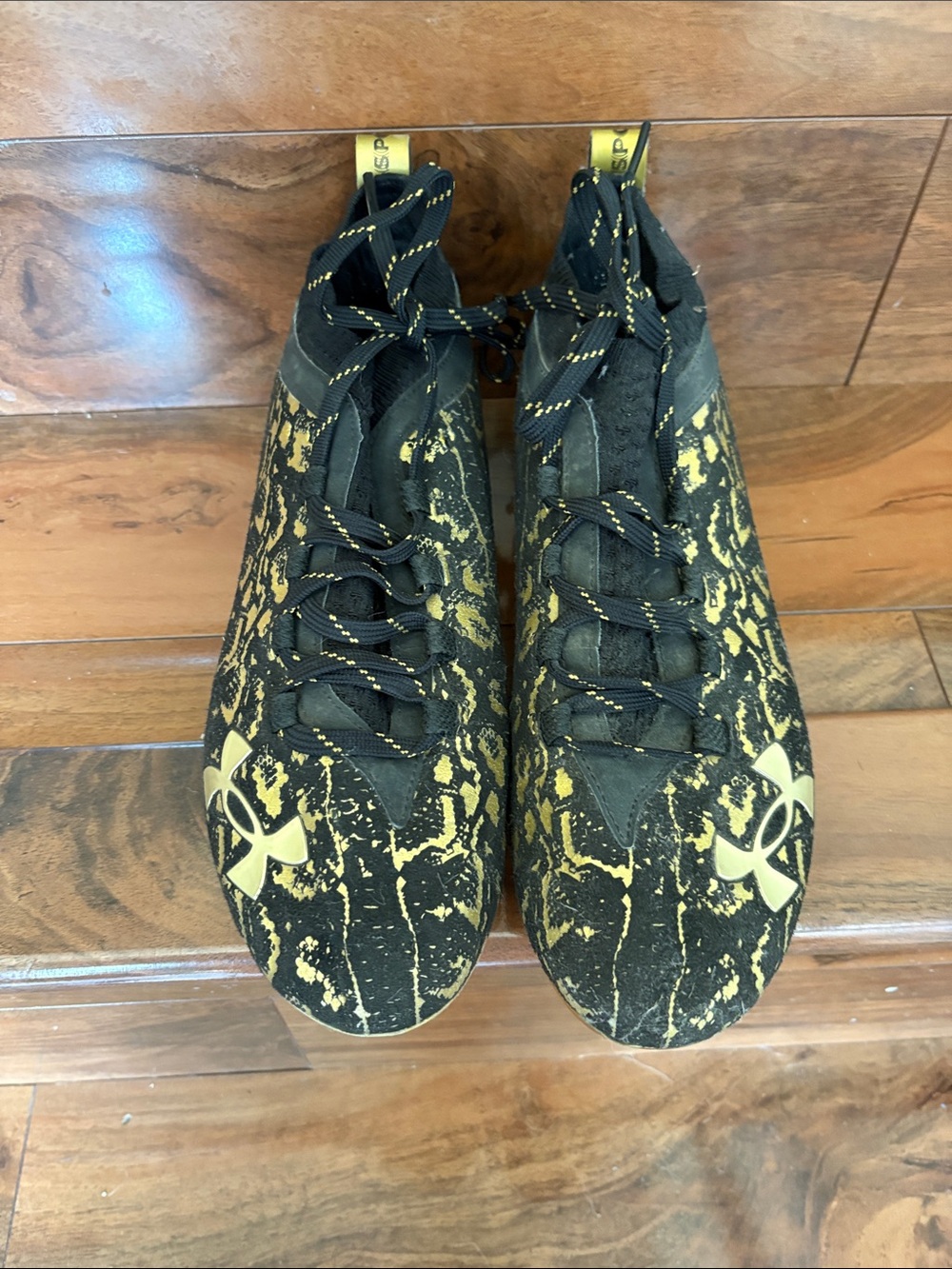 Under Armour Black and Gold Performance Cleats